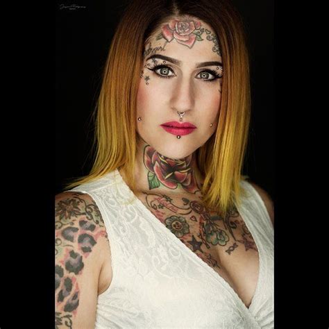 Oiledup tattooed tranny fucked and facialized.